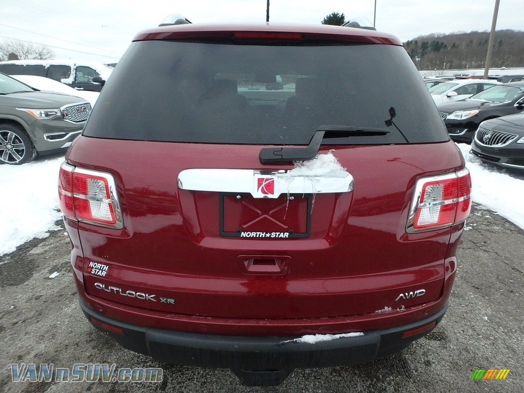 2009 Outlook XR AWD - Red Jewel Tintcoat / Black photo #10