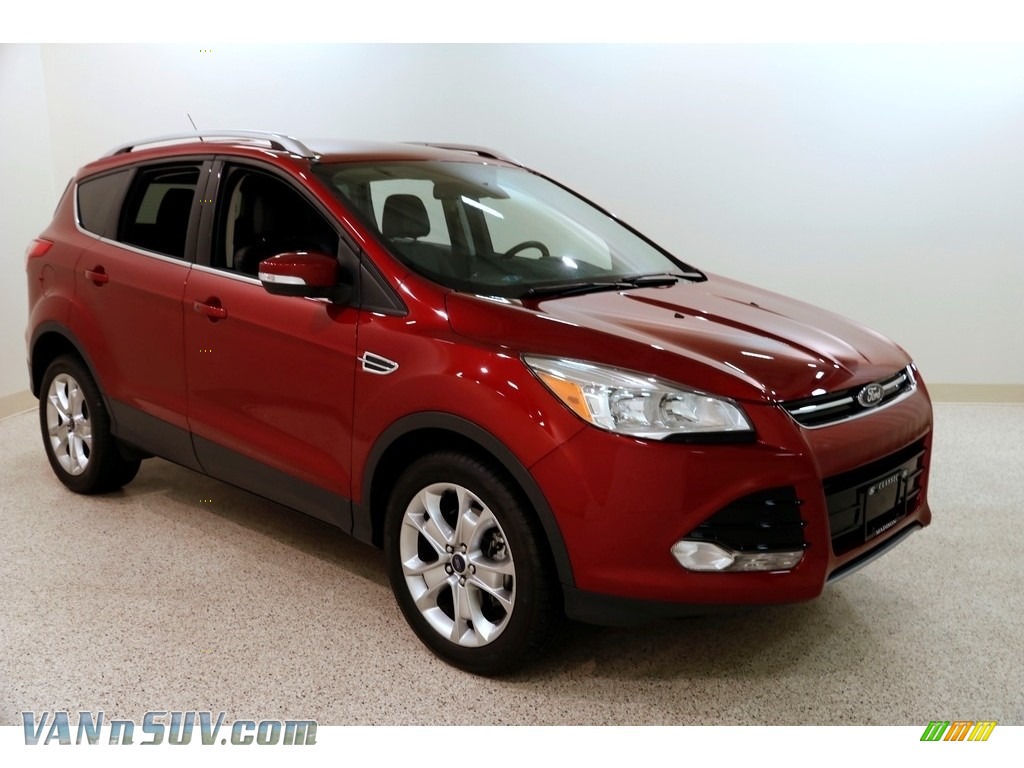 Ruby Red Metallic / Charcoal Black Ford Escape Titanium 4WD
