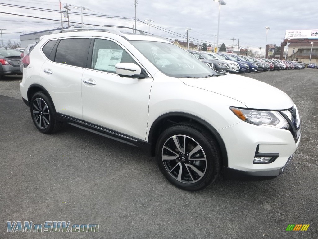 Pearl White / Charcoal Nissan Rogue SL AWD