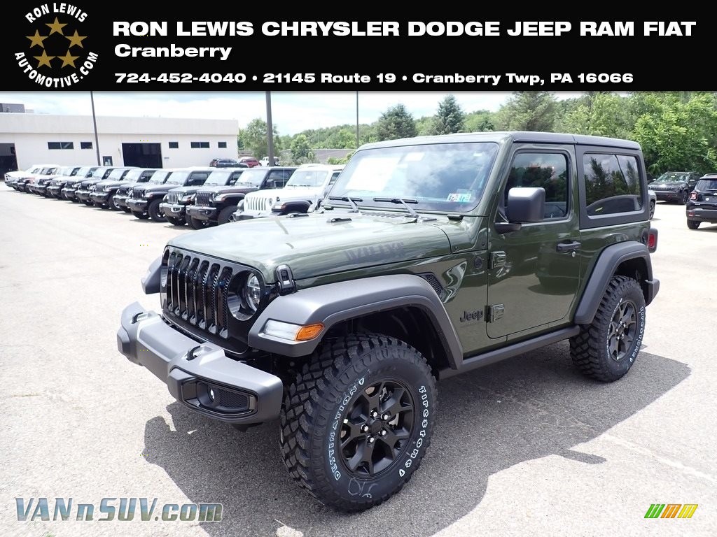 black jeep wrangler with green accents