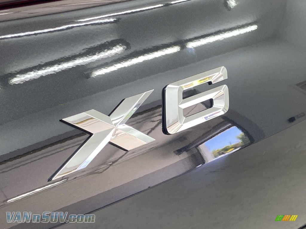 2022 X6 xDrive40i - Black Sapphire Metallic / Tacora Red photo #8